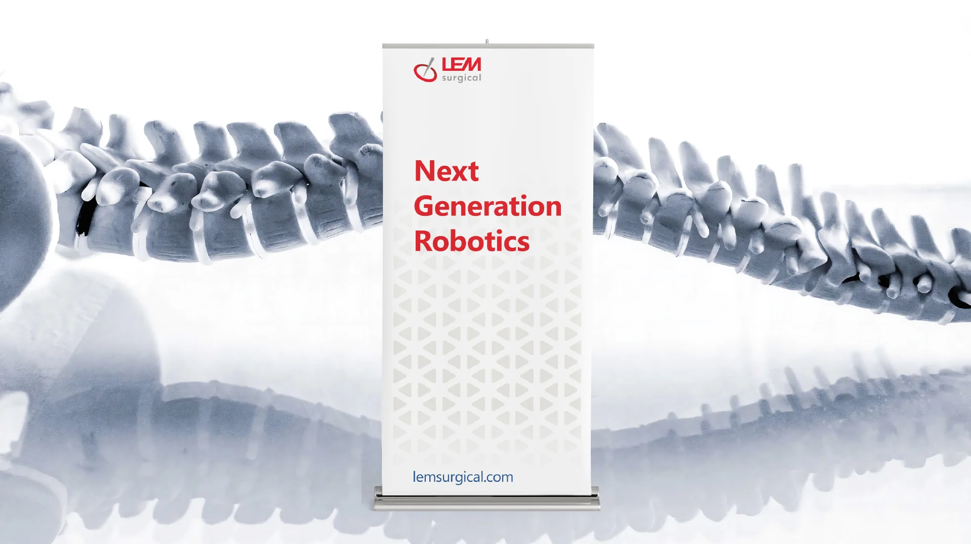 A roll-up banner featuring LEM Surgical and the words ‘Next Generation Robotics’ in front of a model of the